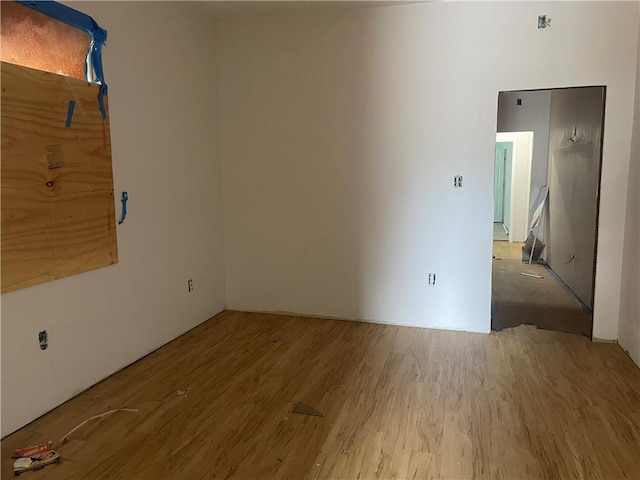 unfurnished room featuring wood finished floors