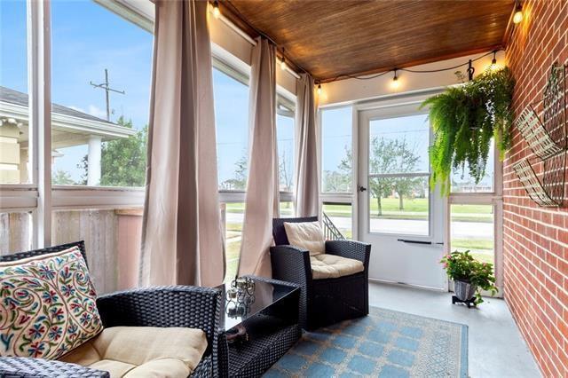 sunroom / solarium featuring wooden ceiling