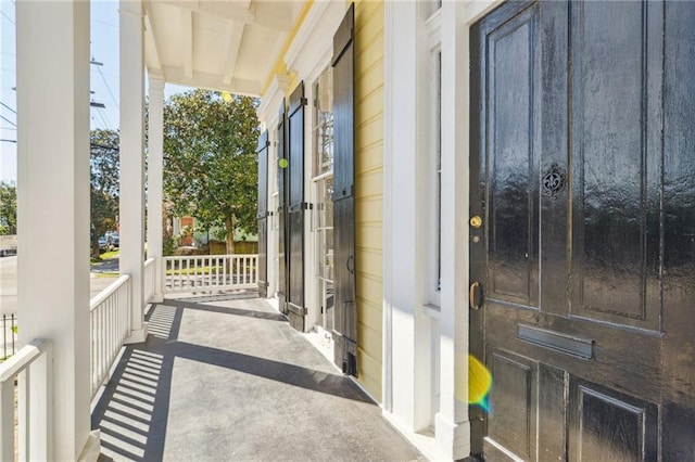 balcony featuring a porch