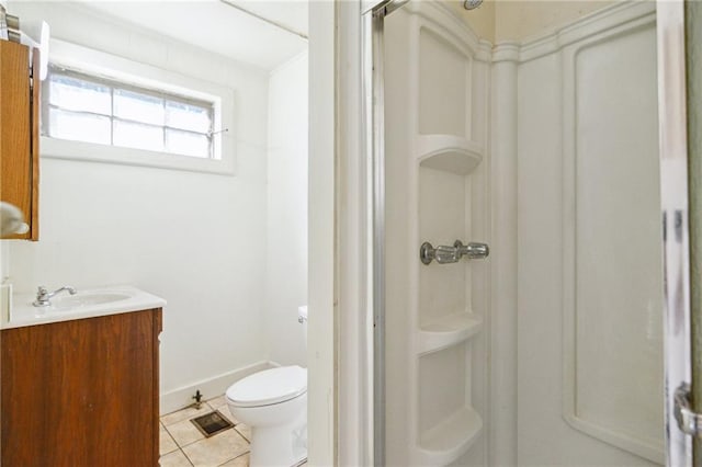 2501 Dauphine St, New Orleans, LA 70117 - full bathroom featuring visible vents, toilet, a stall shower, tile patterned flooring, and vanity