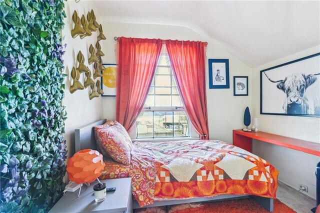 2501 Dauphine St, New Orleans, LA 70117 - carpeted bedroom with vaulted ceiling and multiple windows