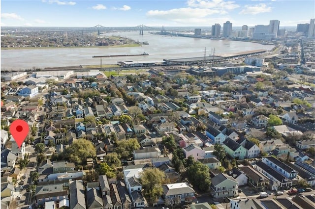 bird's eye view featuring a water view and a view of city