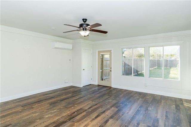 119 Ivy Dr, Covington, LA 70433 - spare room featuring a wall mounted AC, ornamental molding, ceiling fan, and dark wood finished floors