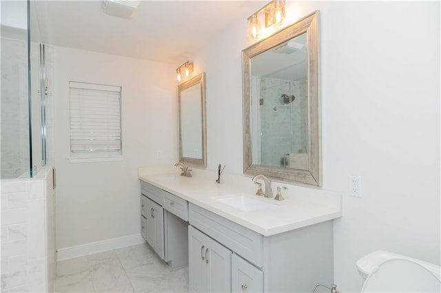 119 Ivy Dr, Covington, LA 70433 - full bath with baseboards, a shower stall, marble finish floor, a sink, and double vanity