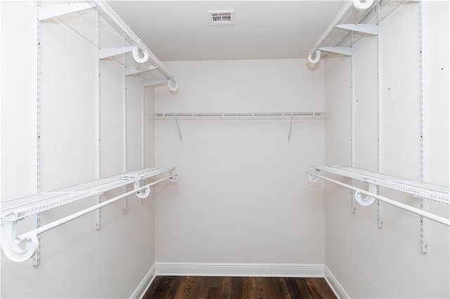 119 Ivy Dr, Covington, LA 70433 - walk in closet featuring visible vents and dark wood finished floors