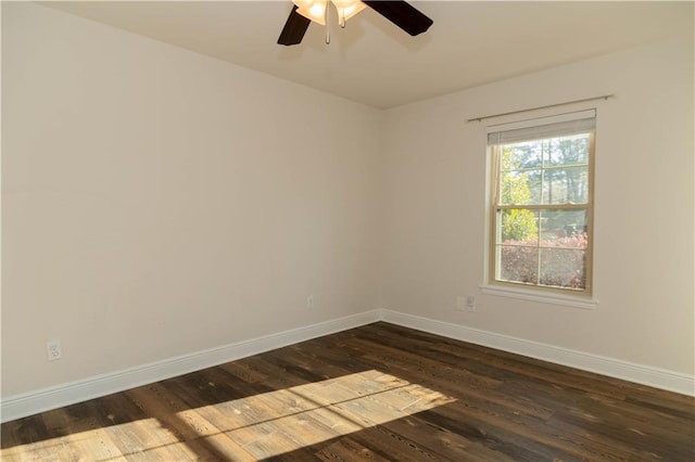 119 Ivy Dr, Covington, LA 70433 - empty room featuring a ceiling fan, baseboards, and dark wood finished floors