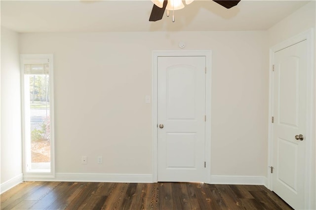 119 Ivy Dr, Covington, LA 70433 - unfurnished room with dark wood finished floors, baseboards, and ceiling fan