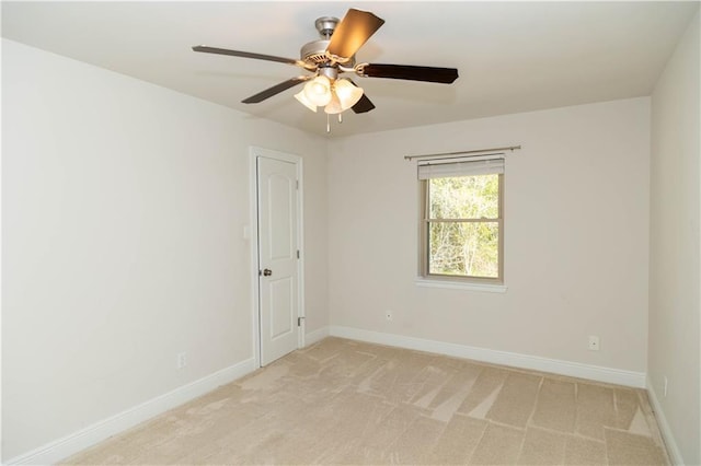119 Ivy Dr, Covington, LA 70433 - unfurnished room featuring baseboards, ceiling fan, and light carpet
