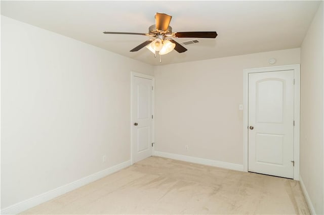 119 Ivy Dr, Covington, LA 70433 - empty room featuring baseboards, visible vents, a ceiling fan, and light colored carpet