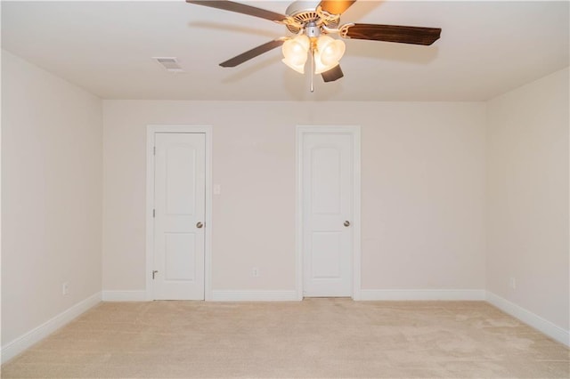 119 Ivy Dr, Covington, LA 70433 - spare room featuring baseboards, visible vents, a ceiling fan, and light carpet