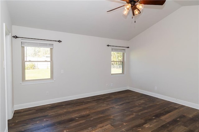 119 Ivy Dr, Covington, LA 70433 - unfurnished room with dark wood finished floors, baseboards, vaulted ceiling, and a ceiling fan