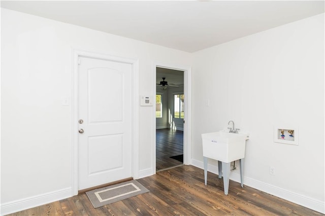 119 Ivy Dr, Covington, LA 70433 - washroom with dark wood-style flooring, hookup for a washing machine, baseboards, ceiling fan, and laundry area