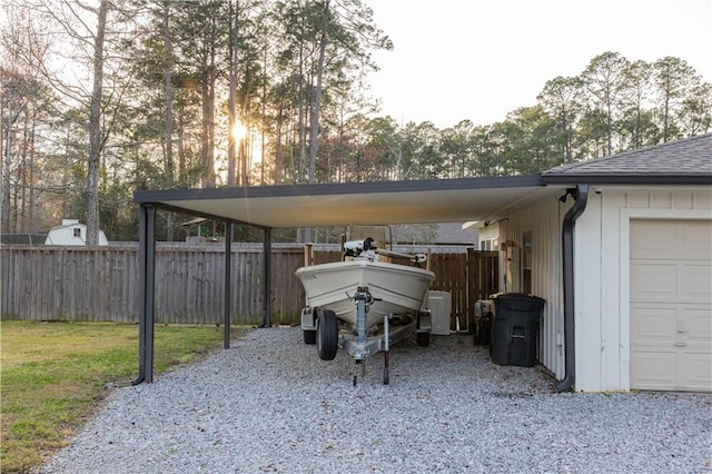 119 Ivy Dr, Covington, LA 70433 - view of car parking with a carport and fence