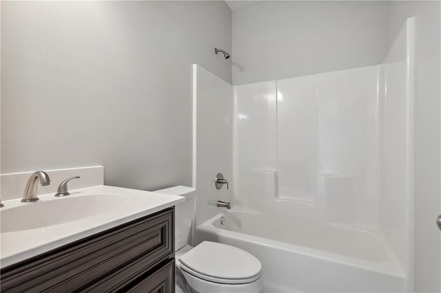 full bath with toilet, shower / bath combination, and vanity