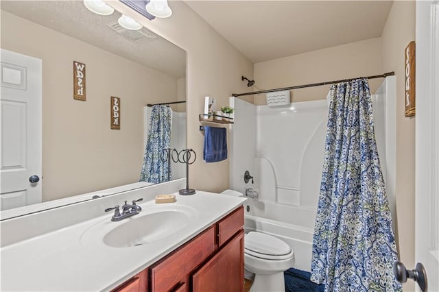 bathroom with shower / tub combo, visible vents, vanity, and toilet