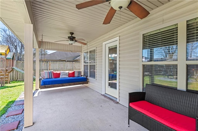 view of patio / terrace featuring fence