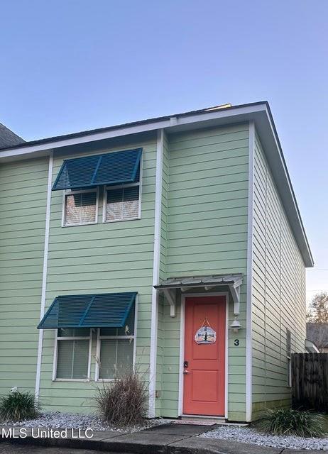 view of front of property with fence