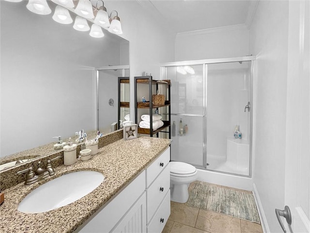 full bathroom with toilet, ornamental molding, tile patterned floors, vanity, and a shower stall