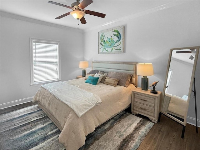 bedroom with ceiling fan, ornamental molding, wood finished floors, and baseboards