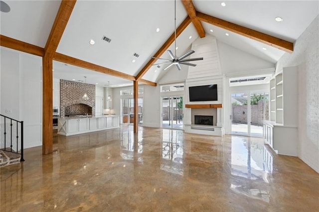 living area with a large fireplace, high vaulted ceiling, marble finish floor, and beam ceiling