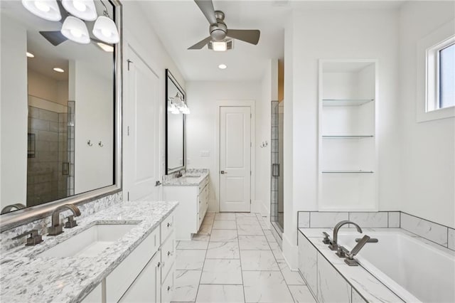 bathroom with two vanities, a sink, marble finish floor, a bath, and a stall shower