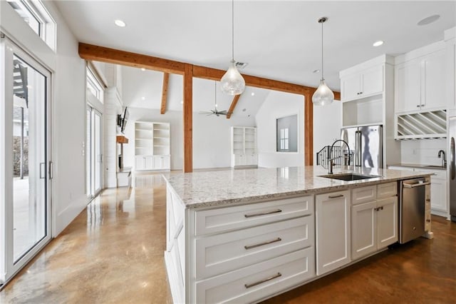 kitchen featuring finished concrete flooring, a sink, a ceiling fan, and white cabinets