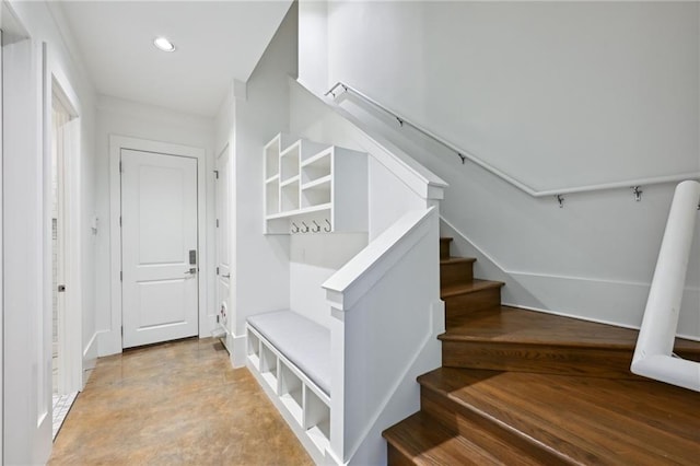 mudroom featuring concrete flooring and recessed lighting