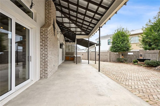 view of patio / terrace with fence