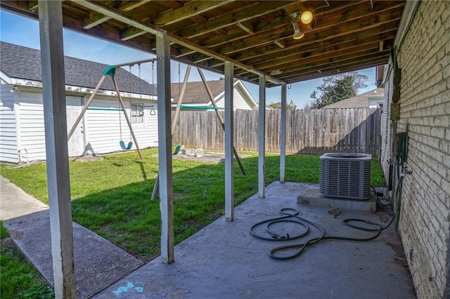 view of patio / terrace with a fenced backyard and cooling unit