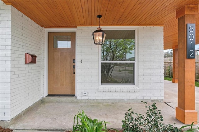 property entrance featuring fence