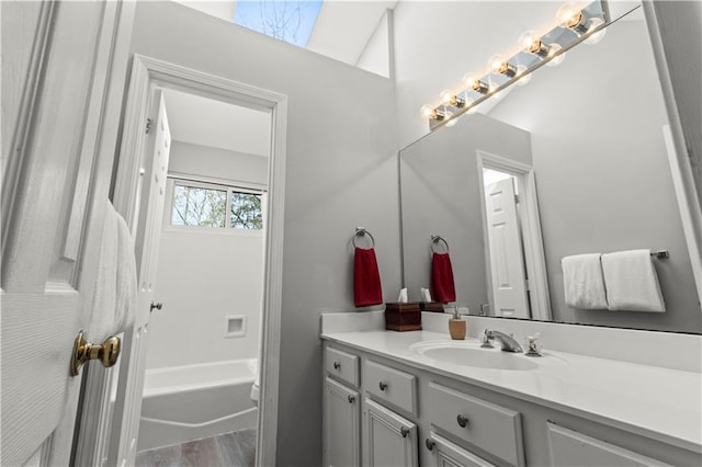 bathroom featuring vanity and wood finished floors