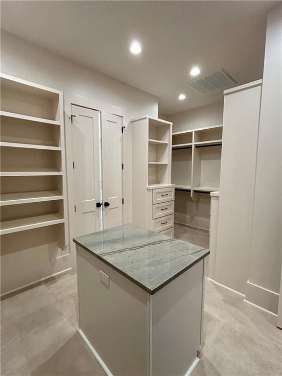 spacious closet with visible vents