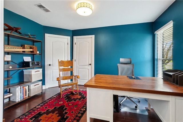 office featuring wood finished floors and visible vents