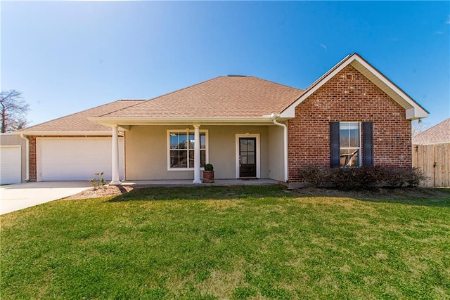 ranch-style house with stucco siding, a front yard, fence, a garage, and driveway