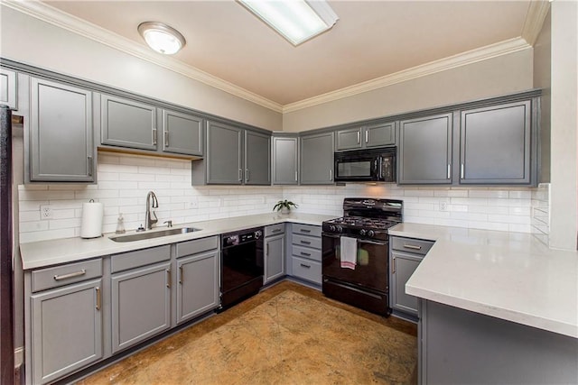 kitchen featuring gray cabinetry, a sink, light countertops, ornamental molding, and black appliances