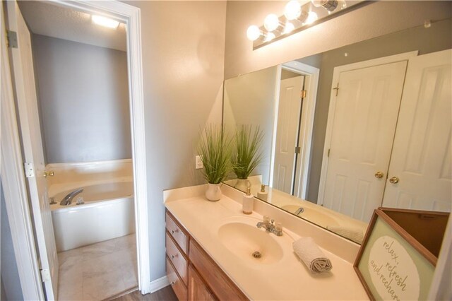 14249 Woodlands Dr Unit 22, Hammond, LA 70401 - full bathroom featuring a bath and vanity