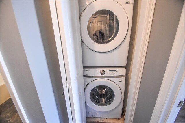 14249 Woodlands Dr Unit 22, Hammond, LA 70401 - washroom featuring stacked washing maching and dryer and laundry area