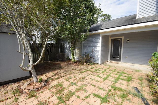 14249 Woodlands Dr Unit 22, Hammond, LA 70401 - view of yard featuring a patio area, fence, and cooling unit