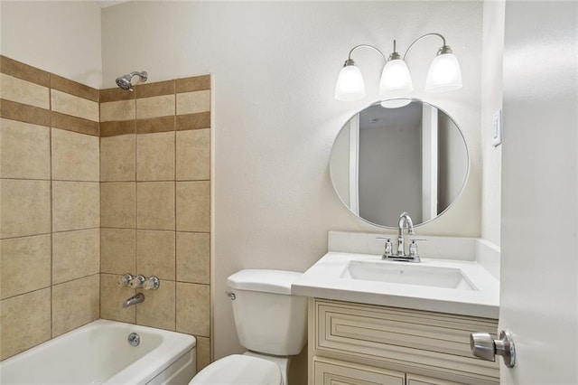 bathroom featuring toilet, vanity, and shower / bathing tub combination