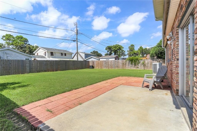 view of patio / terrace featuring a fenced backyard and central AC unit