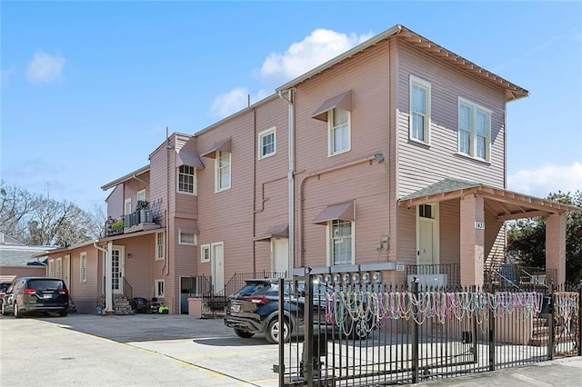 view of property featuring a fenced front yard