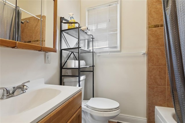 full bathroom featuring vanity, toilet, and shower / bath combo with shower curtain