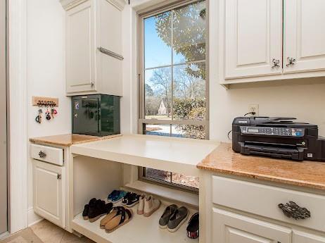 kitchen featuring white cabinetry