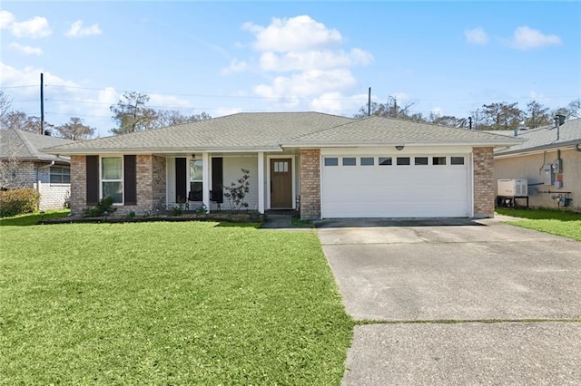 ranch-style house featuring an attached garage, brick siding, a shingled roof, concrete driveway, and a front lawn