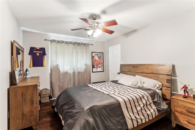 bedroom featuring a ceiling fan and wood finished floors