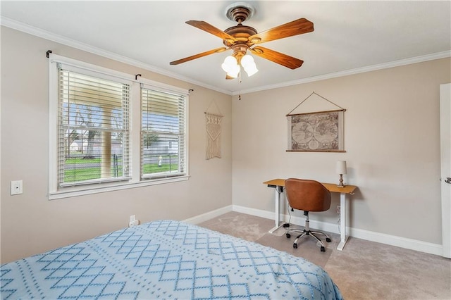 bedroom with a ceiling fan, crown molding, and baseboards