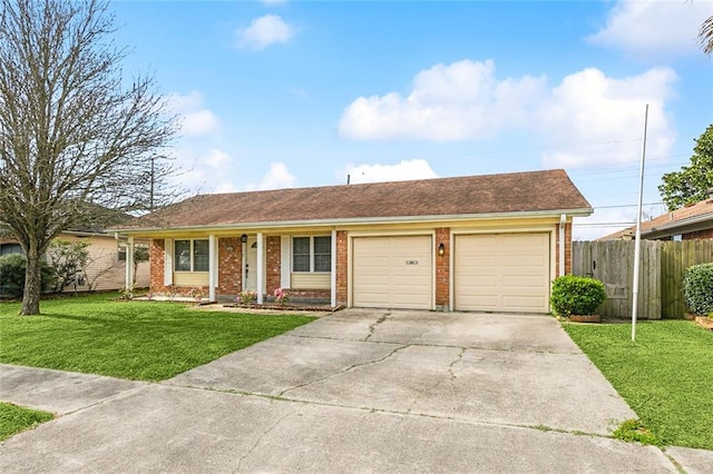 ranch-style house with driveway, brick siding, a front lawn, and fence