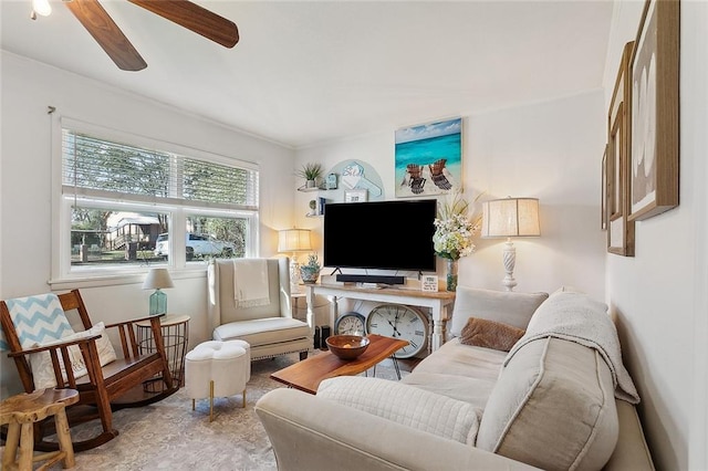 living area featuring ceiling fan