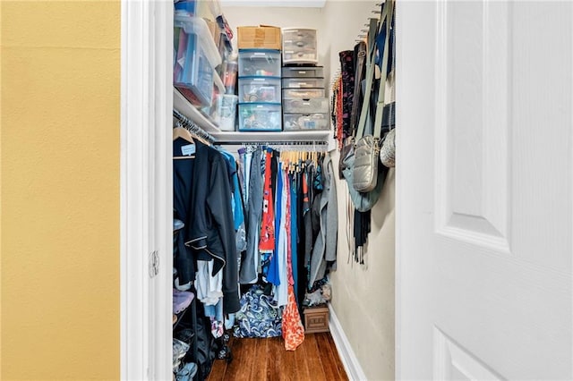 spacious closet with wood finished floors