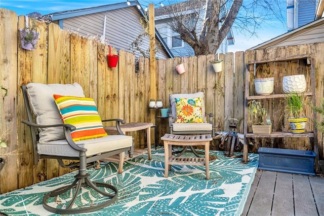 wooden deck featuring fence